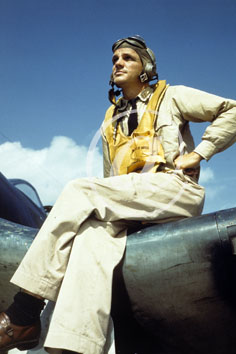 inconnu() Seconde guerre mondiale US Navy en couleurs - Série 80-GK- : Un aviateur assis sur son appareil .
